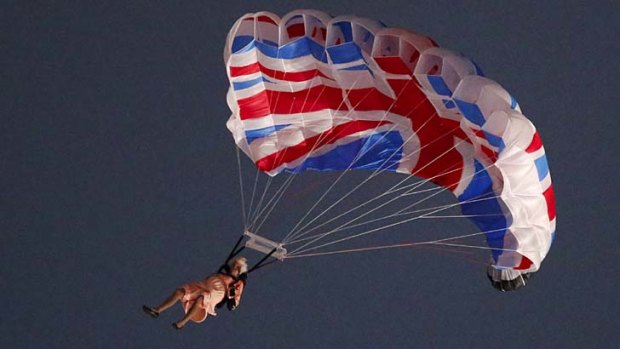 A performer playing the role of Britain's Queen Elizabeth parachuted from a helicopter during the opening ceremony.