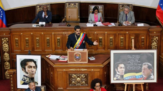 Nicolas Maduro  addresses Constitutional Assembly members during a special session at National Assembly building in Caracas on Thursday.