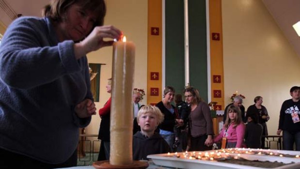 Prayer vigil ... a service for the trapped miners was held in Greymouth yesterday.