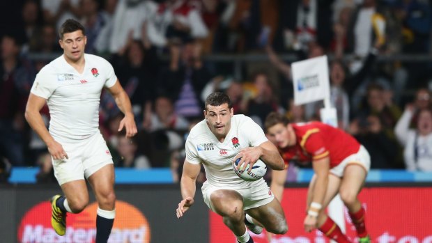 Bright start:  Jonny May  scores the first England try.
