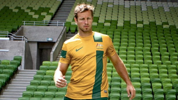 Racing stripe  ... Lucas Neill in the new Socceroos  kit