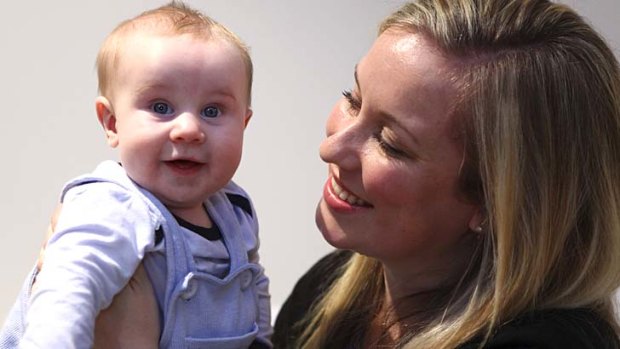Five-month-old baby Sam, the miracle baby, with mum Ellen Lutton.
