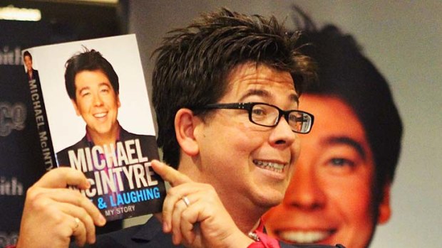 Michael McIntyre with his new book.