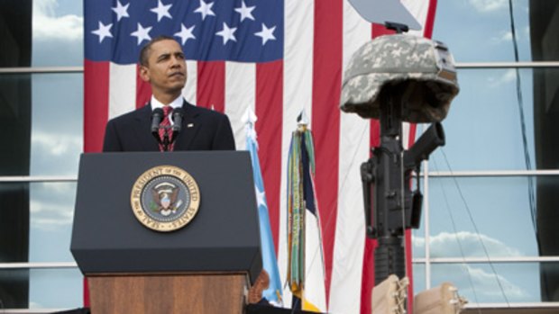 Barack Obama speaks to 15,000 mourners at a memorial service for the 13 massacre victims at Fort Hood.