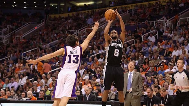 Man of the moment: Patty Mills goes for the basket during San Antonio's win over Phoenix last week.