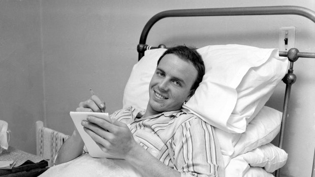 Singer: Johnny Rebb writes songs from his hospital bed in Sydney on 18 August 1962.