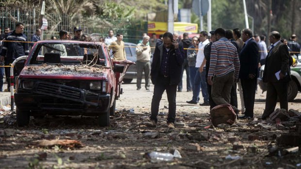 The bombs struck police posts near Cairo University.