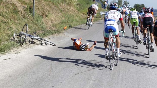 Reminder of a tragedy ... Tom Slagter goes down during stage five.