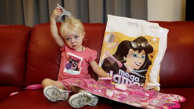Violet Price from Merimbula checks out the Mega Glamour Show Bag at Ronald McDonald House at Canberra Hospital.