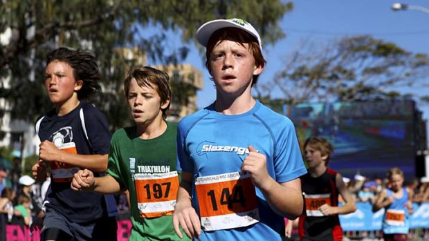 Youngsters participate in the Dreamworld Junior Dash 2km and 4km run as part of the Gold Coast Marathon weekend.