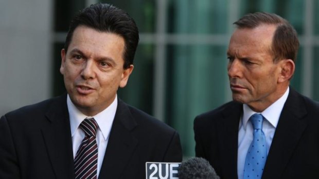 Independent Senator Nick Xenophon and Prime Minister Tony Abbott. The Senate is continuing to oppose key budget measures.