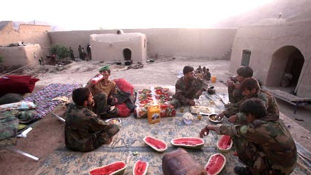 Sunset...watermelon awaits Afghan National Army soldiers in Helmand province as they prepare to break the Ramadan feast.