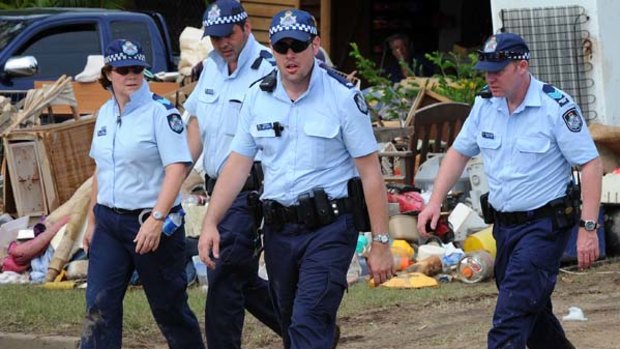Police on patrol in flood-devastated suburbs: Beware of fake tradesmen offering cheap repairs.