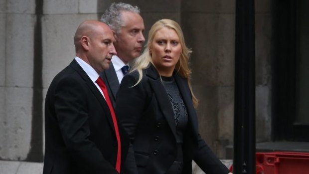 Honouring a promise ... Australian DJ Mel Greig (right) leaves The Royal Courts of Justice.