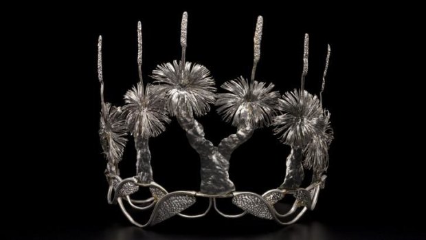 A tiara by Fiona Hall features a frieze of Xanthorrhoea plants made from the tin used for sardine cans.