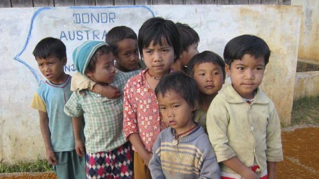 Bipartisan target setback ... the federal government's decision to strip back close to $3 billion in promised foreign aid funding will cost some 250,000 lives in countries like Burma, where AusAID spends an average of $50 million per annum.