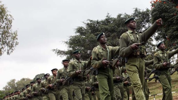 Marching across ... Kenyan troops crossing into Somali territory.