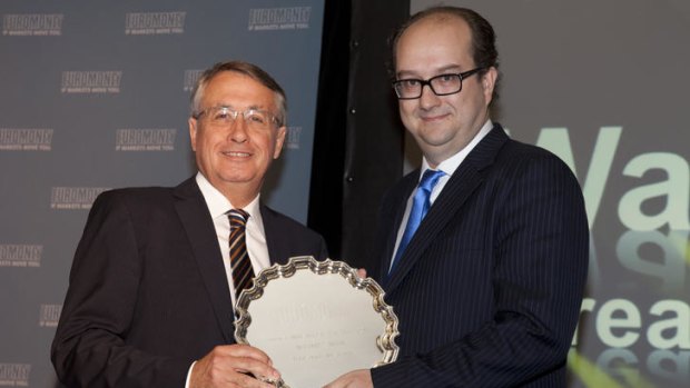 Wayne Swan receives his Finance Minister of the Year award from <i>Euromoney</i> editor Clive Horwood.