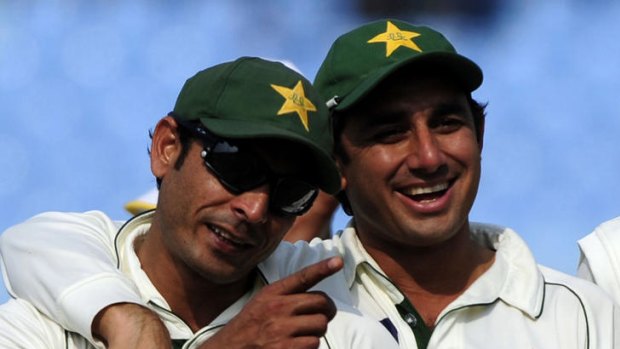 Abdur Rehman (L) is congratulated after destroying Bangladesh's batting order.