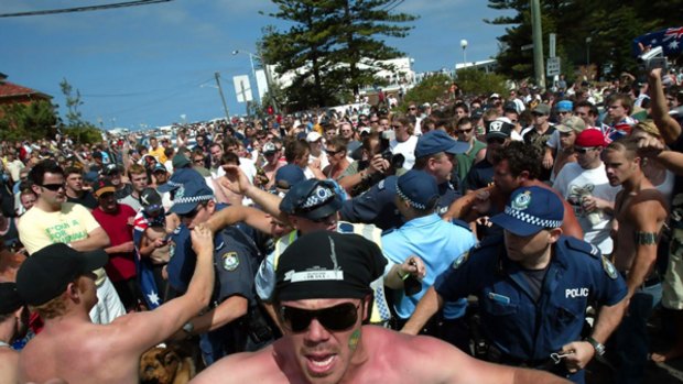 An angry crowd shout racial taunts against Lebanese at Sydney's North Cronulla during the riots of 2005.