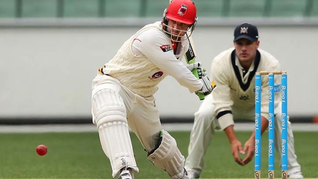 In form: Phil Hughes hits a ton against Victoria, his second in five shield games this season.
