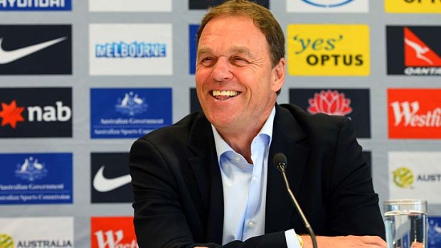 ''Strange there are so many'': Socceroos coach Holger Osieck faces the cameras at a press conference.