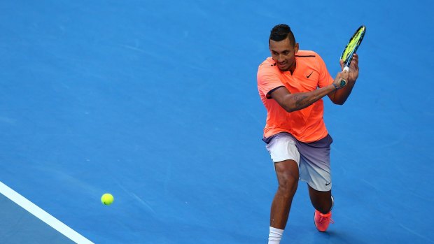 Met with boos: Nick Kyrgios on his way to a straight sets Hopman Cup loss to Jack Sock in Perth last week.
