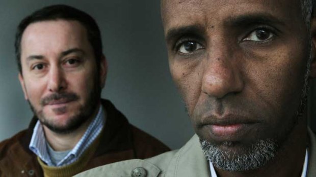 Prison program leaders Nail Aykan (left) and Sheikh Abdinur Weli.