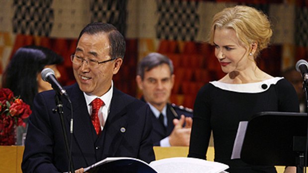 Positive sign: UN Secretary-General Ban Ki-moon accepts  the 5 million signatures of people opposing violence against women from ambassador Nicole Kidman.