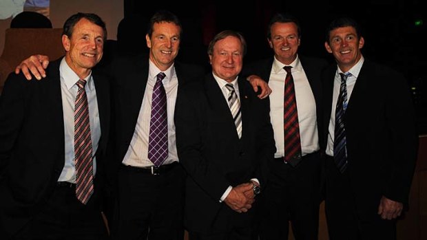 Essendon's famous four: (from left) Terry, Neale, Anthony and Chris Daniher with legendary coach Kevin Sheedy (centre) in 2009.