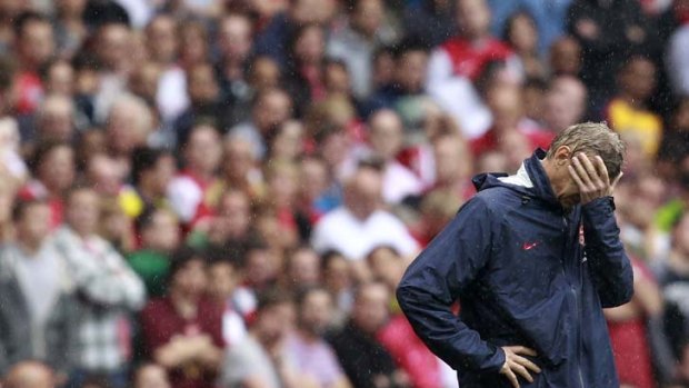 Fans want talent ... Arsenal manager Arsene Wenger shows dismay as his side goes down to Liverpool at London's Emirates Stadium. The Gunners have one point from a possible six.
