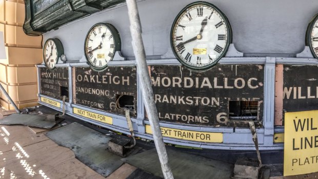 Antique signs uncovered during the restoration. Photo by Jason South
