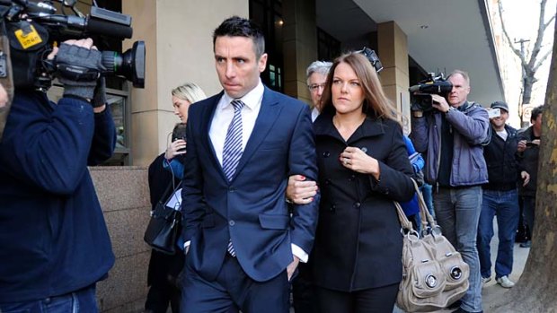 Stephen Milne leaving court on Friday with his wife Melissa.
