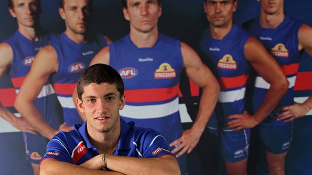 Off the leash: Bulldog Tom Liberatore has responded well to "tough love".