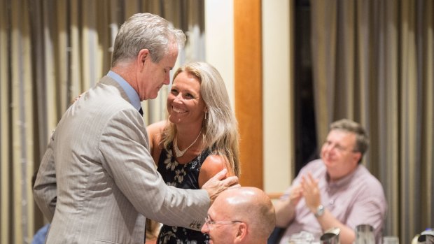 Ross Cameron embraces Kirralie Smith after his speech.