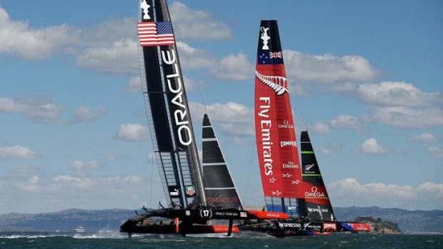 Oracle Team USA and Team New Zealand compete during the final race.