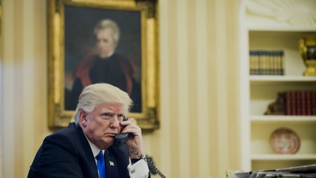 US President Donald Trump speaks on the phone with Malcolm Turnbull. 