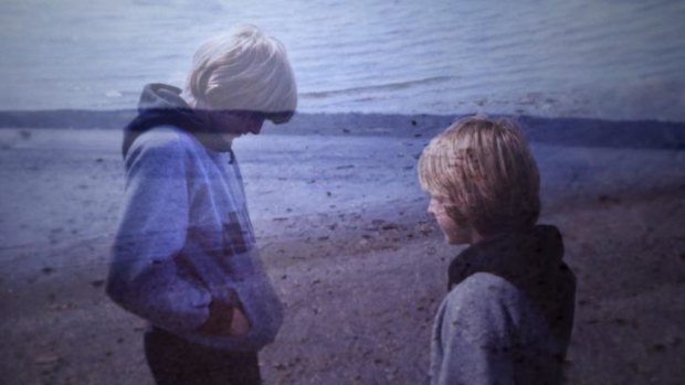 A teenage Kurt Cobain on the beach.