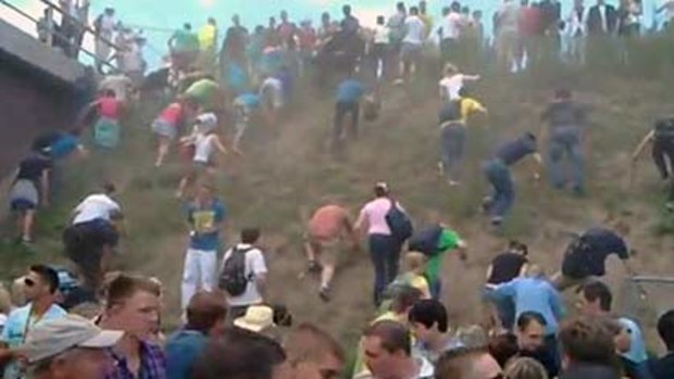 A television image of festival goers escaping the crush.