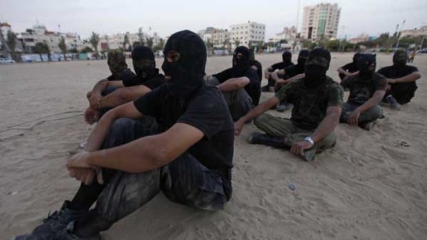 The 'Ezz Al-Din Al Qassam' militia, the military wing of Hamas, during a training session in Gaza City.