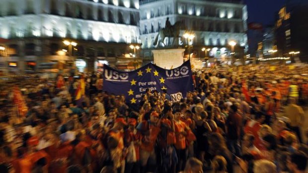 Demonstrators take to the streets of Madrid.
