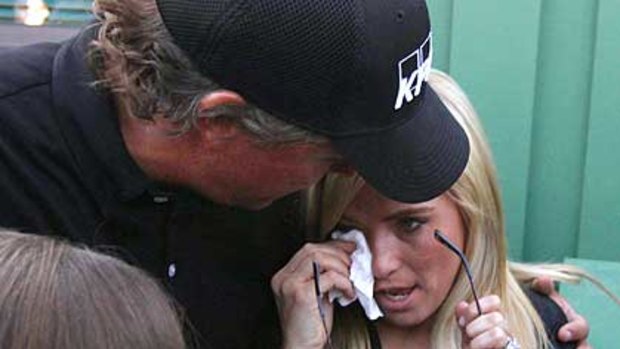 Tears of joy ,,, Phil and Amy Mickelson.