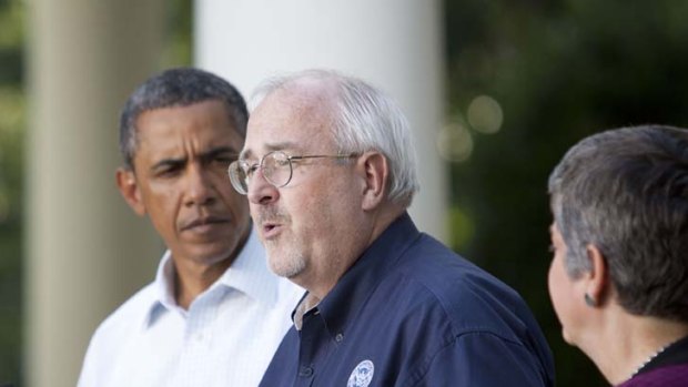 Father figures ... Barack Obama and FEMA's Craig Fugate.