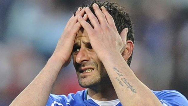 Going home ... 2006 World Cup winner Vincenzo Iaquinta feels the pain after Italy were dumped out of the 2010 tournament.
