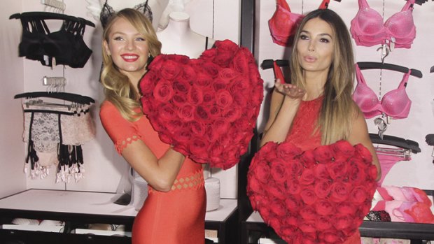 Models Candice Swanepoel and Lily Aldridge attend the Victoria's Secret Angels Celebrate Valentine's Day in New York.