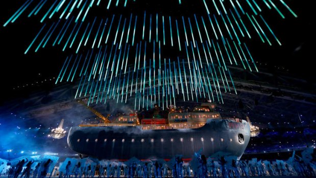 An ice breaker enters the stadium during the opening ceremony.