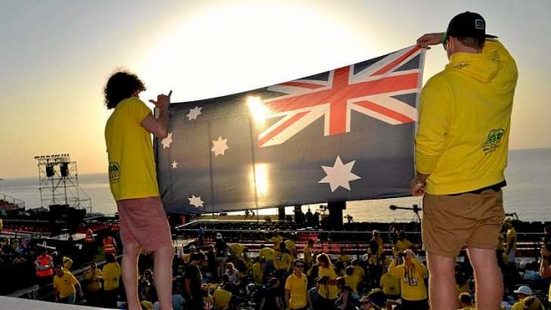 The fanatics pose for a photo as they wait for the dawn service.