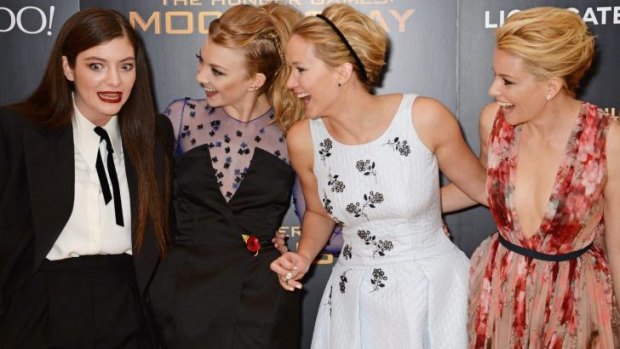 Lorde cracking up <i>The Hunger Games: Mockingjay</i> actors Natalie Dormer, Jennifer Lawrence and Elizabeth Banks during the world premiere of the film in London.