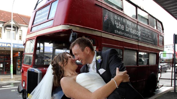 ‘‘The main event’’ ... Gillian Campbell and Matthew Sharratt, who were married at St Patrick’s Catholic Church in Bondi yesterday, had a London  double-decker bus for their guests.