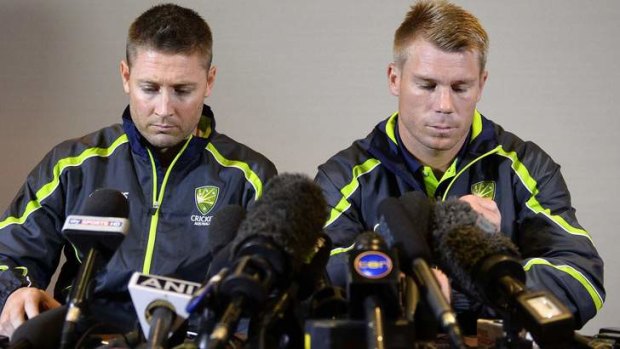 No drink problem: David Warner fronts the media with captain Michael Clarke.